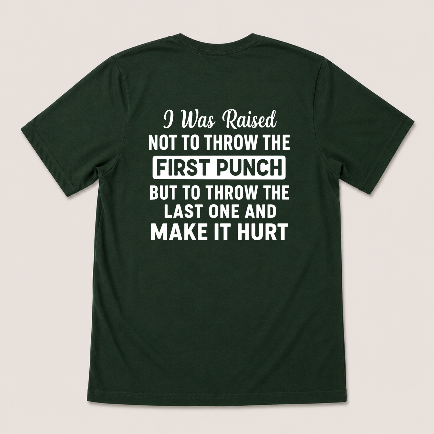 I WAS RAISED NOT TO THROW THE FIRST PUNCH BUT TO THROW THE LAST ONE AND MAKE IT HURT T-SHIRT (BACK PRINT)