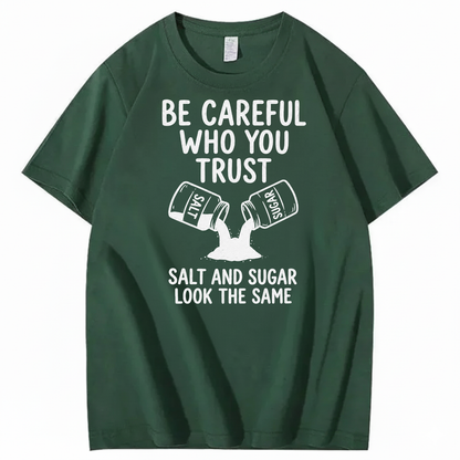 BE CAREFUL WHO YOU TRUST — SALT AND SUGAR LOOK THE SAME T-SHIRT (FRONT PRINT)
