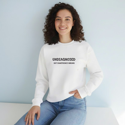 Unisex Black Graphic Sweatshirt – “Undiagnosed But Something’s Wrong” – Crewneck, Long Sleeve, Cotton‑Blend Fleece (S–XL)