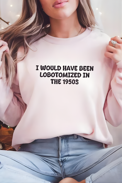 Unisex Black Crewneck Sweatshirt – “I Would’ve Been L*botomized in the 1950s” – Dark Humor Slogan, Relaxed Fit
