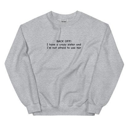 BACK OFF! I HAVE A CRAZY SISTER AND I’M NOT AFRAID TO USE HER SWEATSHIRT (FRONT EMBROIDERY)